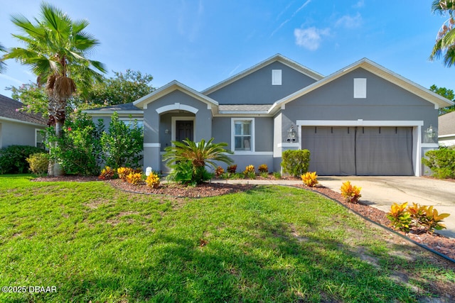 view of front of house with a garage and a front lawn