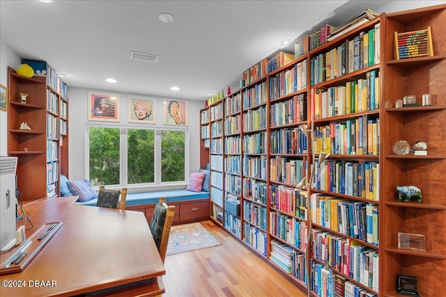 office space with light wood-type flooring