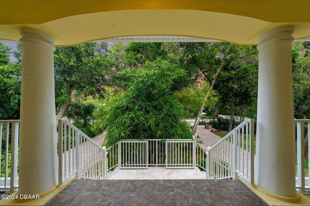 view of patio featuring a balcony