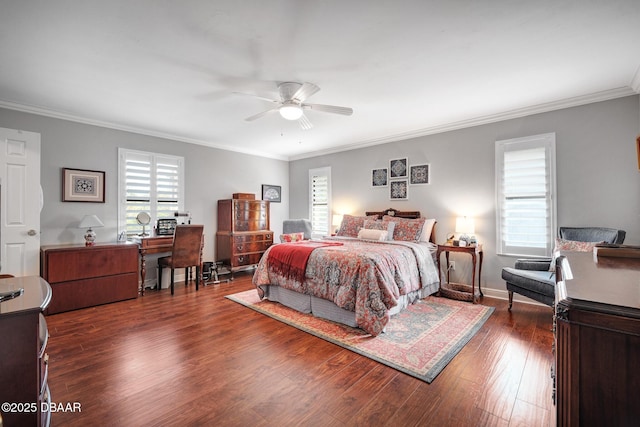 bedroom featuring dark wood-type flooring, ceiling fan, and ornamental molding