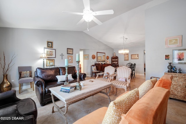 living room with ceiling fan and lofted ceiling