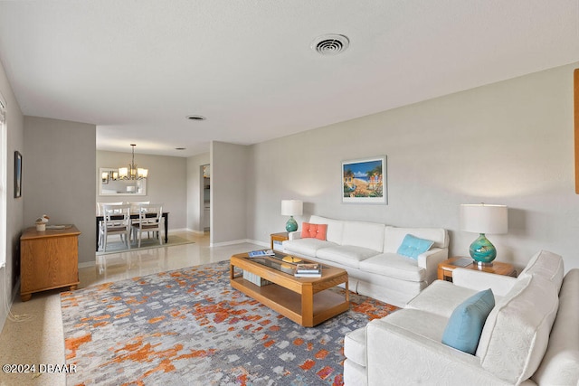 living room with a notable chandelier