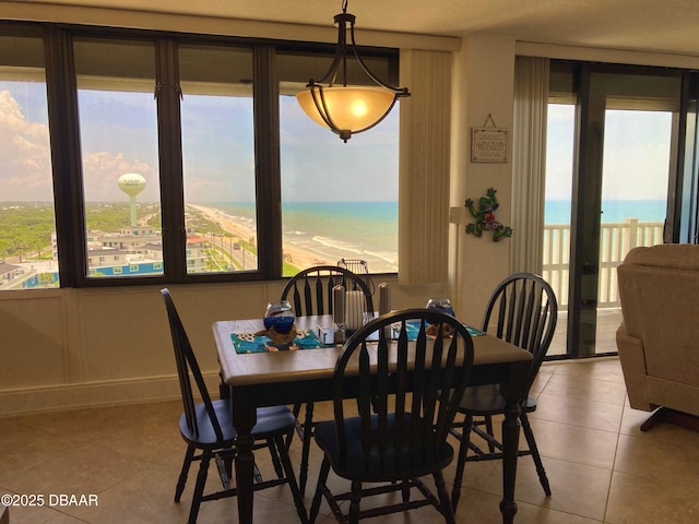 3580 S Ocean Shore Blvd Unit 905, Flagler Beach, FL 32136 - dining area with tile patterned floors and plenty of natural light