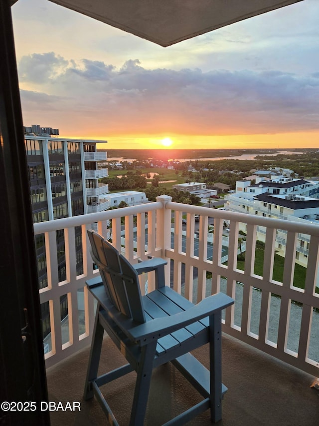 3580 S Ocean Shore Blvd Unit 905, Flagler Beach, FL 32136 - balcony at dusk featuring a city view