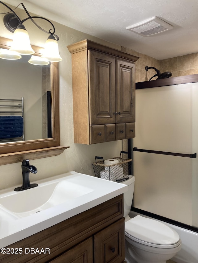 3580 S Ocean Shore Blvd Unit 905, Flagler Beach, FL 32136 - full bathroom with vanity, a shower, and a textured wall