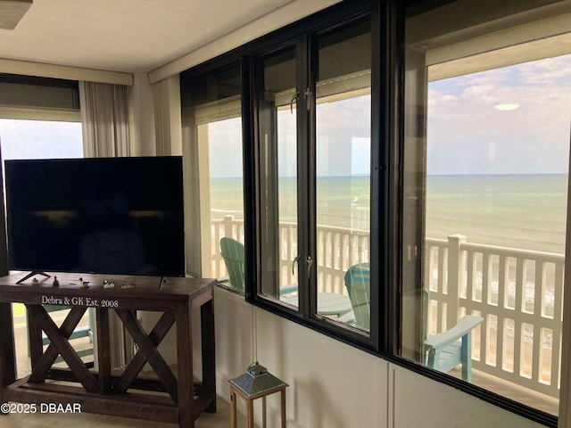 3580 S Ocean Shore Blvd Unit 905, Flagler Beach, FL 32136 - sunroom / solarium with view of water and beach