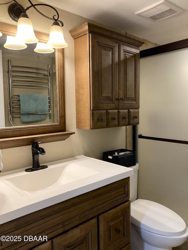 3580 S Ocean Shore Blvd Unit 905, Flagler Beach, FL 32136 - bathroom featuring vanity and a towel warmer