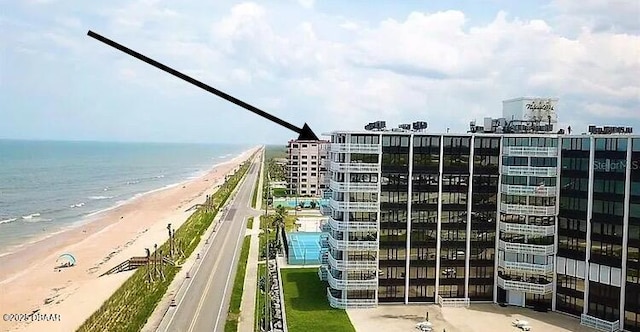 3580 S Ocean Shore Blvd Unit 905, Flagler Beach, FL 32136 - view of building exterior featuring view of water and beach