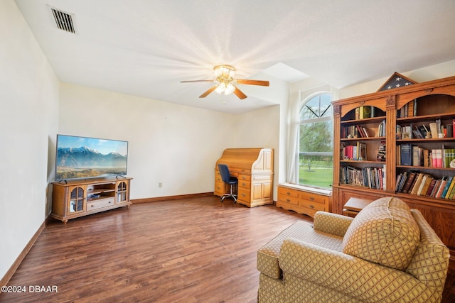 sitting room featuring hardwood / wood-style floors and ceiling fan