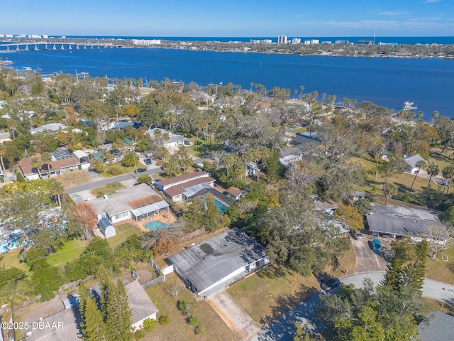 drone / aerial view with a water view