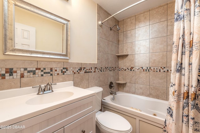 full bathroom featuring toilet, vanity, and shower / bathtub combination with curtain