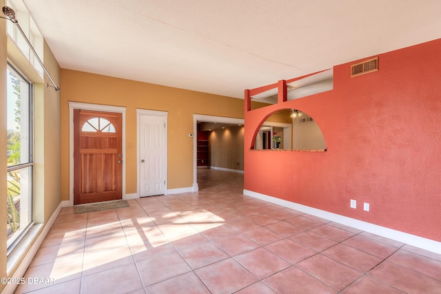 entrance foyer with light tile patterned flooring