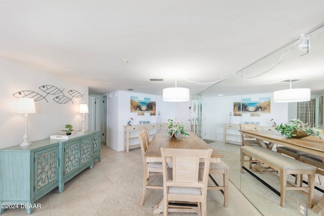 dining room with light tile patterned floors