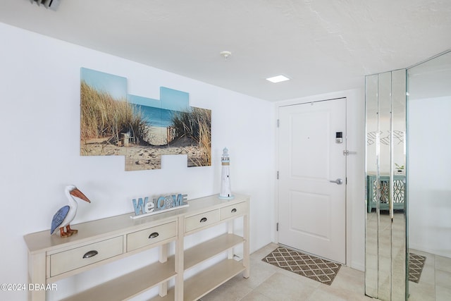 3855 S Atlantic Ave Unit 1206B, Daytona Beach Shores, FL 32118 - entryway with light tile patterned flooring