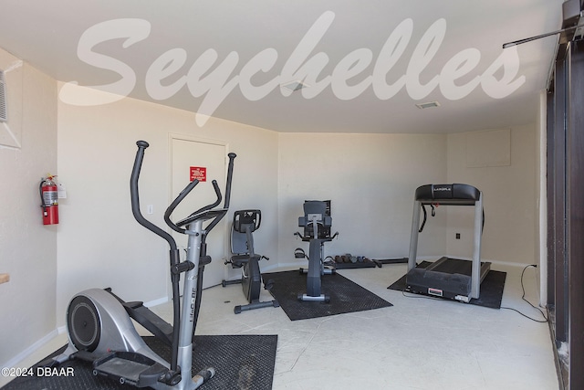 3855 S Atlantic Ave Unit 1206B, Daytona Beach Shores, FL 32118 - workout room with baseboards