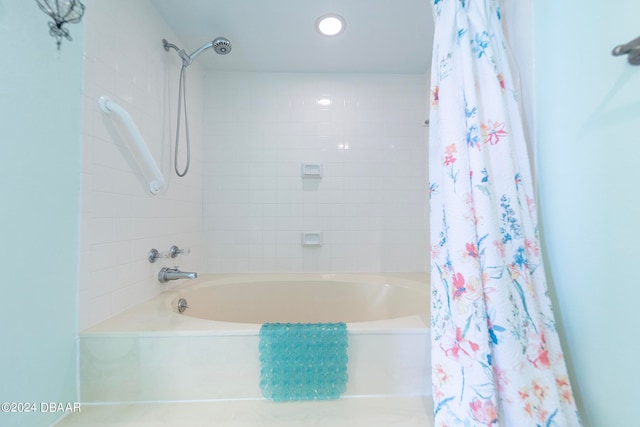 bathroom featuring shower / bath combo with shower curtain