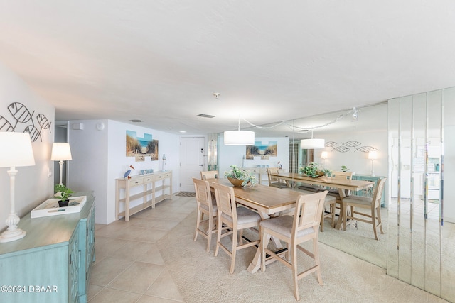 view of tiled dining space