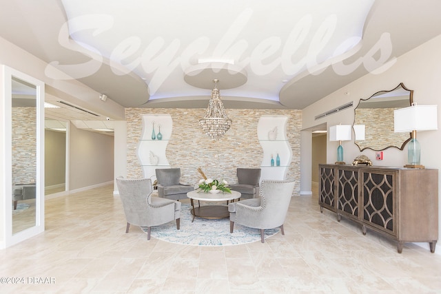 living area featuring a notable chandelier and vaulted ceiling