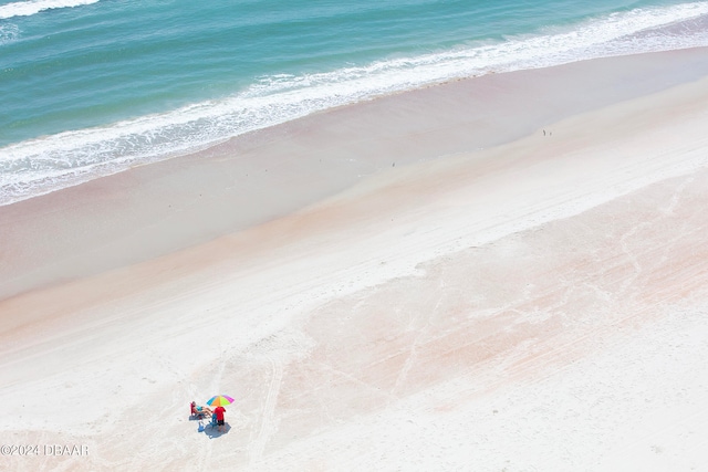 exterior space featuring a beach view