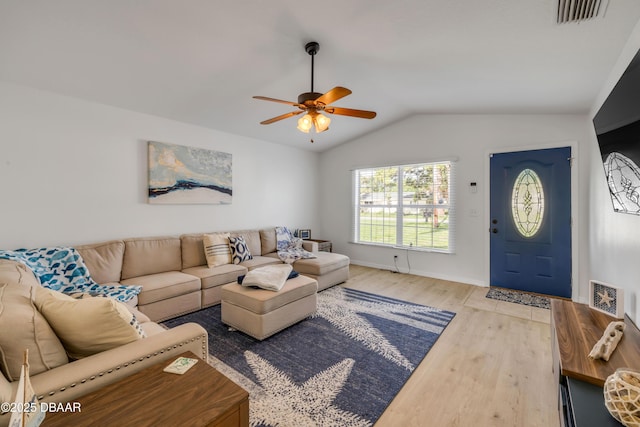 805 Spruce St, New Smyrna Beach, FL 32168 - living area with wood finished floors, ceiling fan, and lofted ceiling