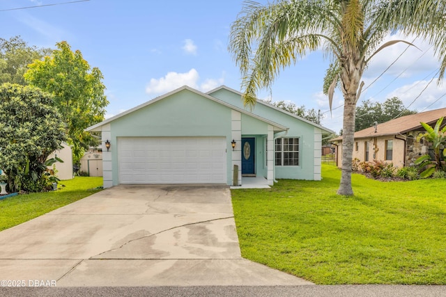 805 Spruce St, New Smyrna Beach, FL 32168 - view of front of house featuring stucco siding, a front yard, an attached garage, and driveway