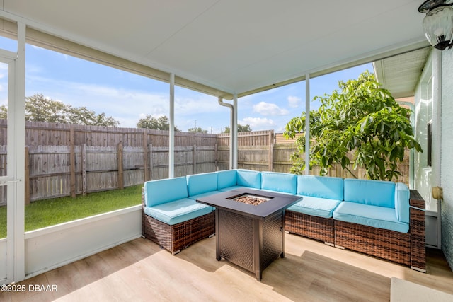 805 Spruce St, New Smyrna Beach, FL 32168 - sunroom / solarium featuring an outdoor living space with a fire pit