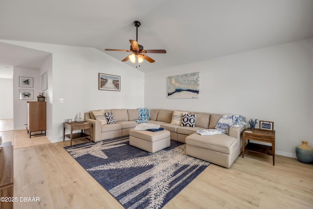 805 Spruce St, New Smyrna Beach, FL 32168 - living room with wood finished floors, a ceiling fan, and vaulted ceiling