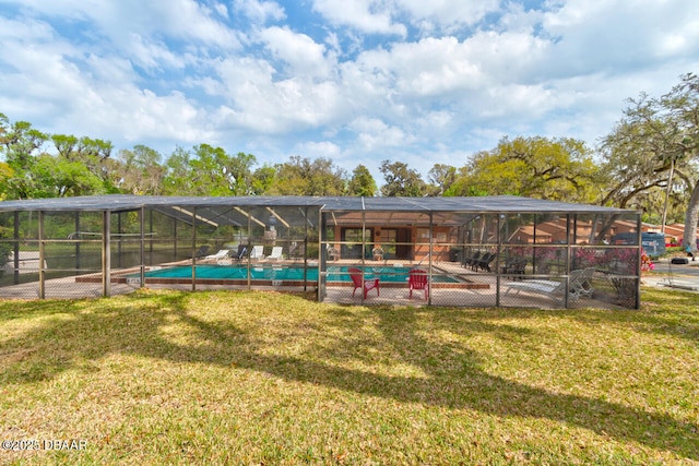 view of yard featuring glass enclosure and a fenced in pool