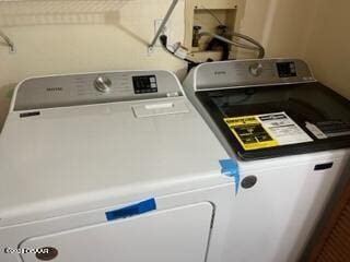 laundry area with washer and dryer