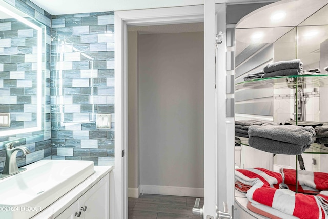 bathroom featuring wood-type flooring and vanity