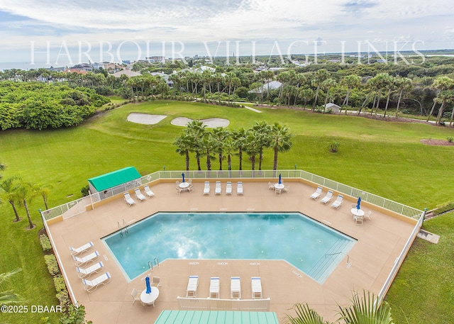 4650 Links Village Dr Unit C-505, Ponce Inlet, FL 32127 - community pool with a yard, view of golf course, and a patio area