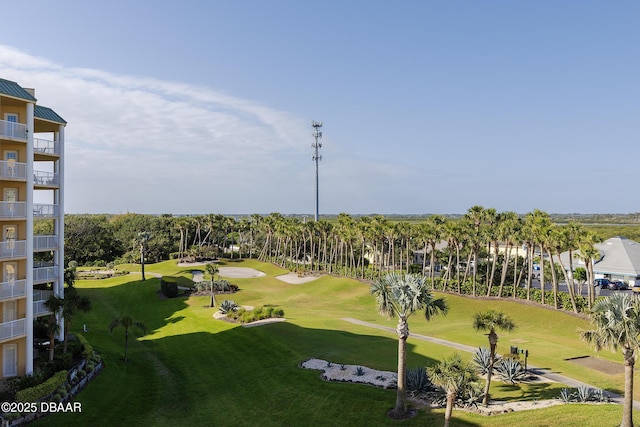 4650 Links Village Dr Unit C-505, Ponce Inlet, FL 32127 - view of community with golf course view and a yard