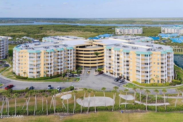 4650 Links Village Dr Unit C-505, Ponce Inlet, FL 32127 - drone / aerial view of apartment complex and a nearby body of water