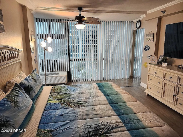 bedroom with dark wood-type flooring and crown molding