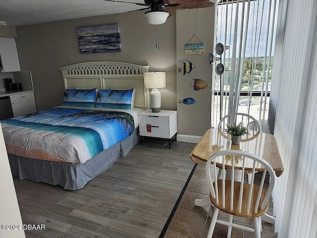 bedroom featuring wood-type flooring and ceiling fan