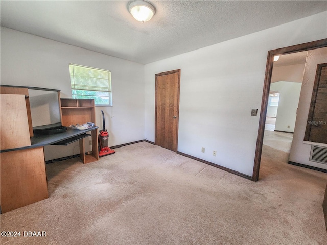 1119 Indigo Rd, Ormond Beach, FL 32174 - carpeted office featuring baseboards and a textured ceiling