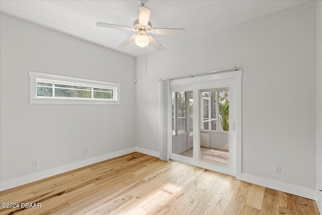 unfurnished room with ceiling fan and light hardwood / wood-style floors