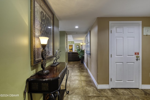 2071 S Atlantic Ave Unit 605, Daytona Beach, FL 32118 - hallway featuring baseboards and recessed lighting