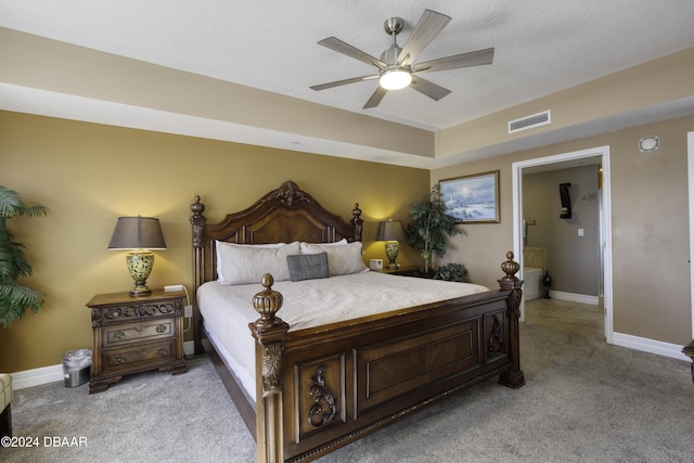 2071 S Atlantic Ave Unit 605, Daytona Beach, FL 32118 - bedroom with light colored carpet, baseboards, and a ceiling fan