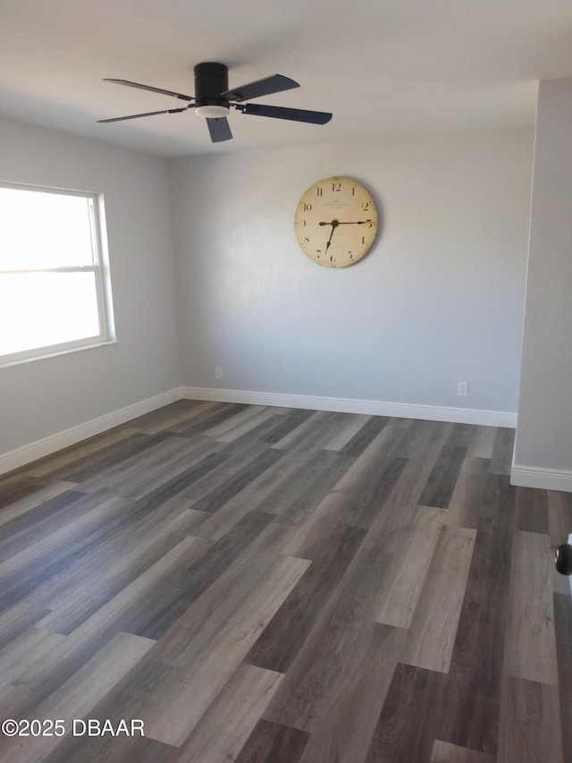3 Sea Watch Ter, Ormond Beach, FL 32176 - spare room featuring baseboards, dark wood-type flooring, and ceiling fan