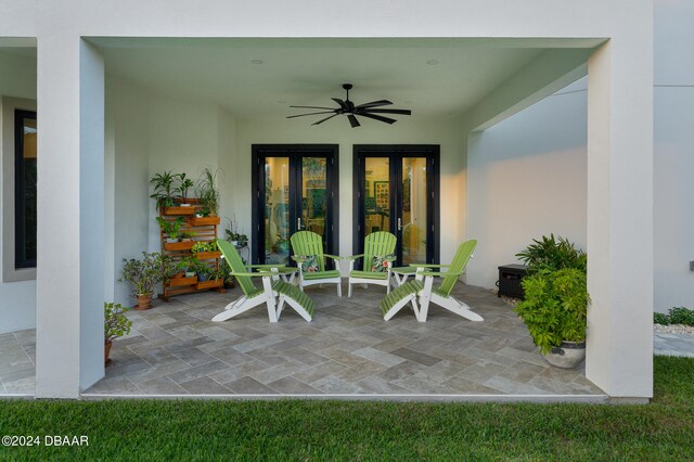 view of patio / terrace featuring french doors and ceiling fan