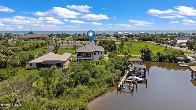 drone / aerial view with a water view