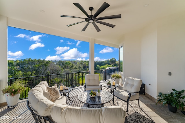 view of patio / terrace with a balcony and an outdoor hangout area