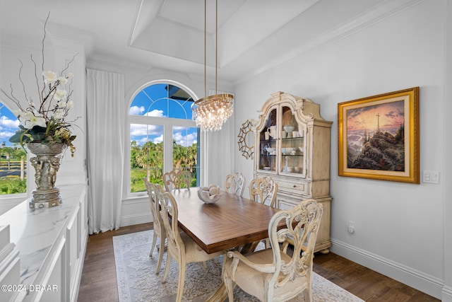 dining space featuring ornamental molding, dark hardwood / wood-style floors, and an inviting chandelier