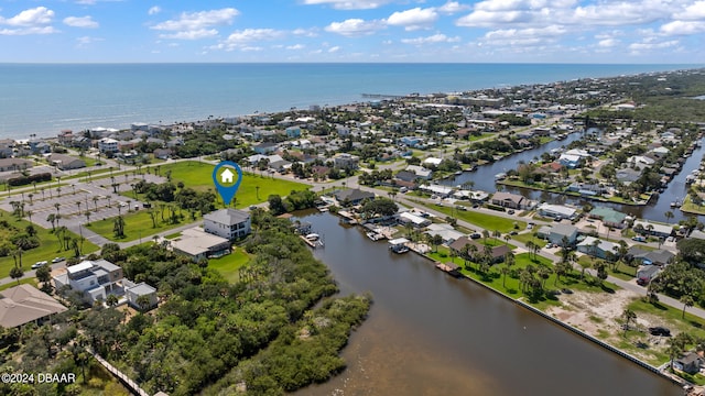 bird's eye view with a water view