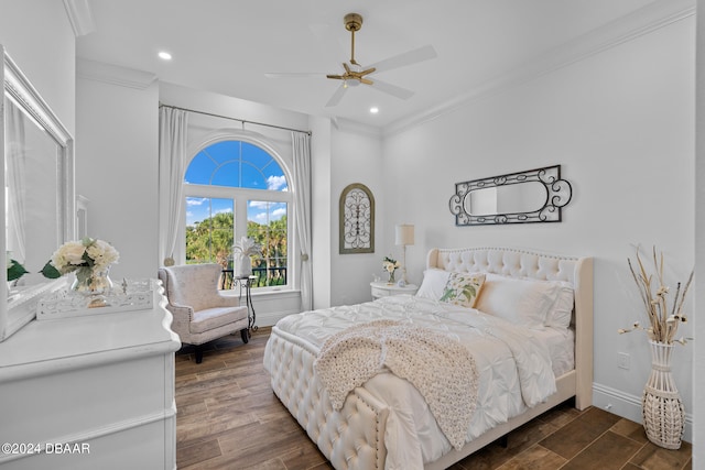 bedroom featuring ceiling fan, dark hardwood / wood-style floors, and crown molding