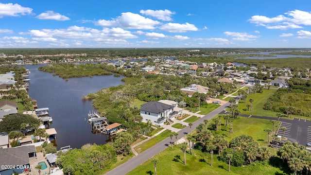 bird's eye view with a water view