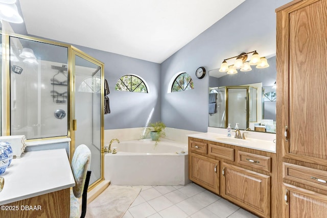 full bath featuring a garden tub, lofted ceiling, a shower stall, vanity, and tile patterned flooring