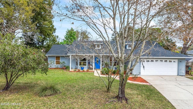 view of front of home with an attached garage, covered porch, a shingled roof, concrete driveway, and a front lawn