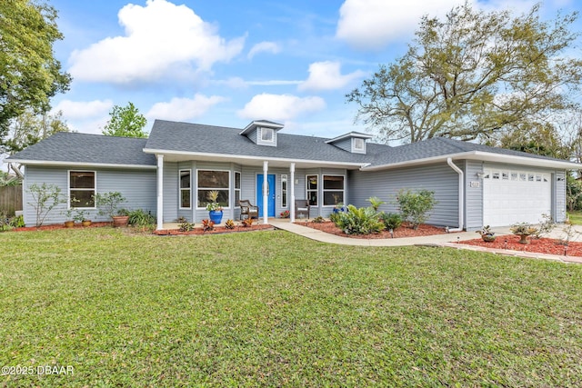 view of front of home featuring a porch, a shingled roof, a front lawn, and an attached garage